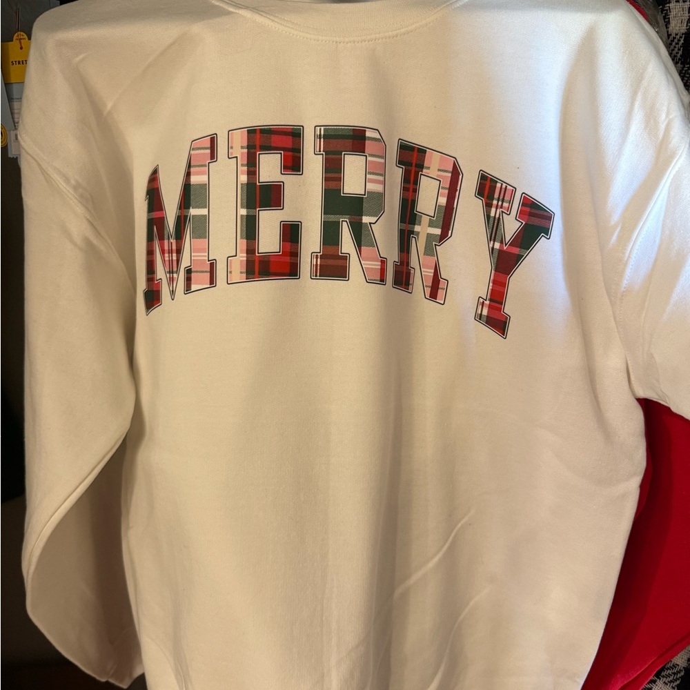 Brand new MERRY crew neck sweatshirt.  Available in sm - xlg
